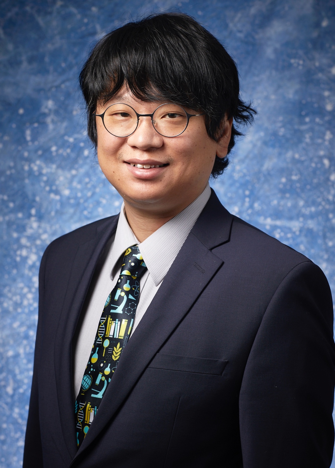 Headshot of Dr. Taisuke Izumi 