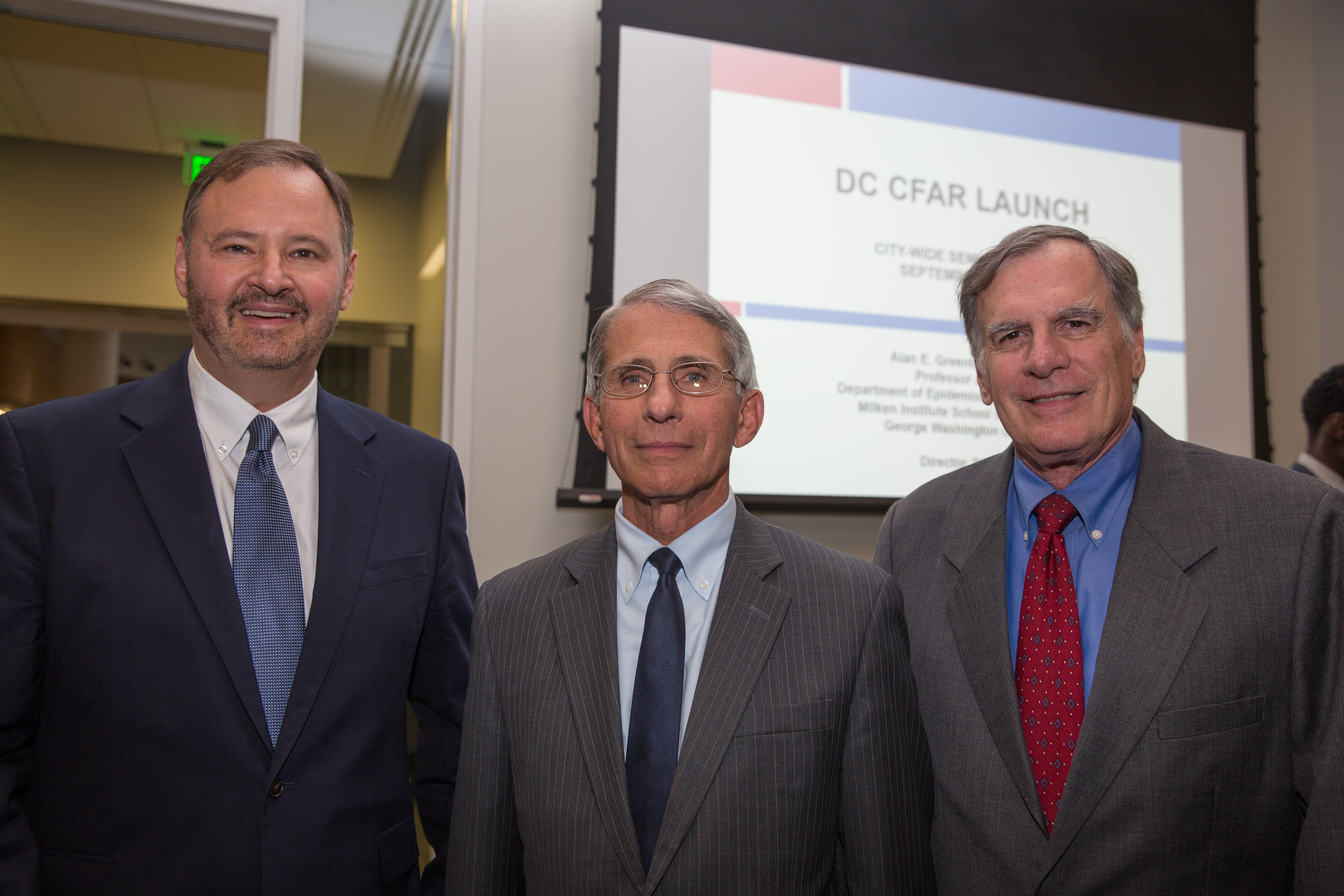 Alan Greenberg, Anthony Fauci, and Gary Simon smile at the camera
