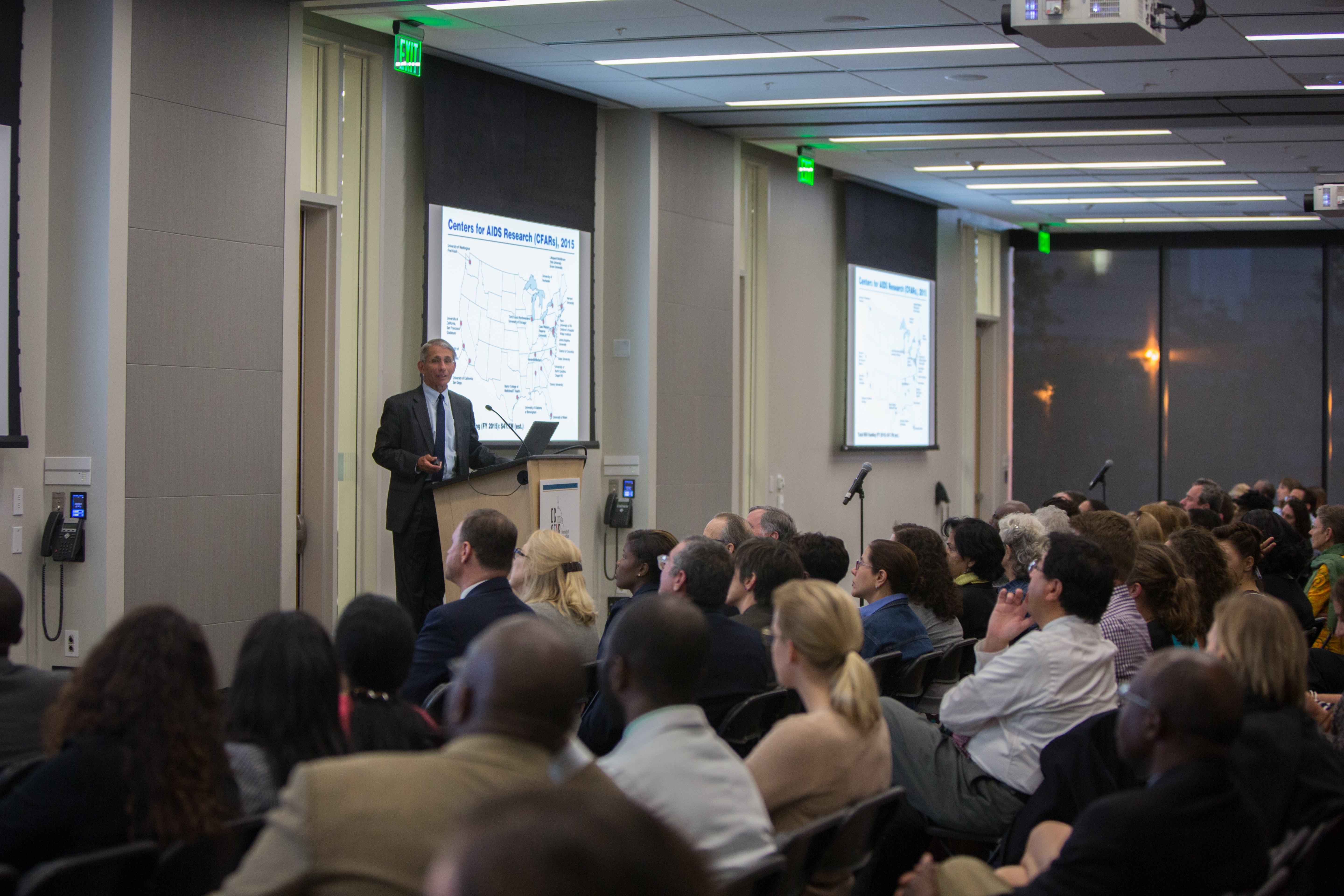 The audience listens to Dr. Fauci's presentation