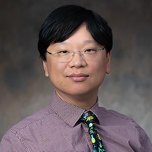 Headshot of Dr. Taisuke Izumi